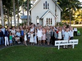 Wedding party outside St Mary's chapel on the beach, Port Douglas
